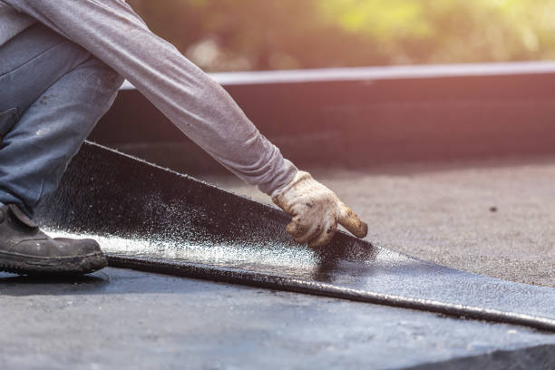 Professional Basement Waterproofing technician working in Stockbridge, MI